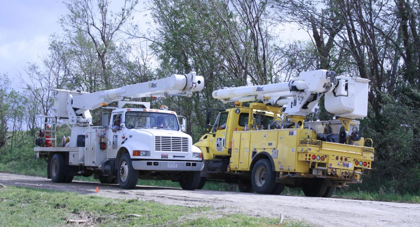utility trucks on the road