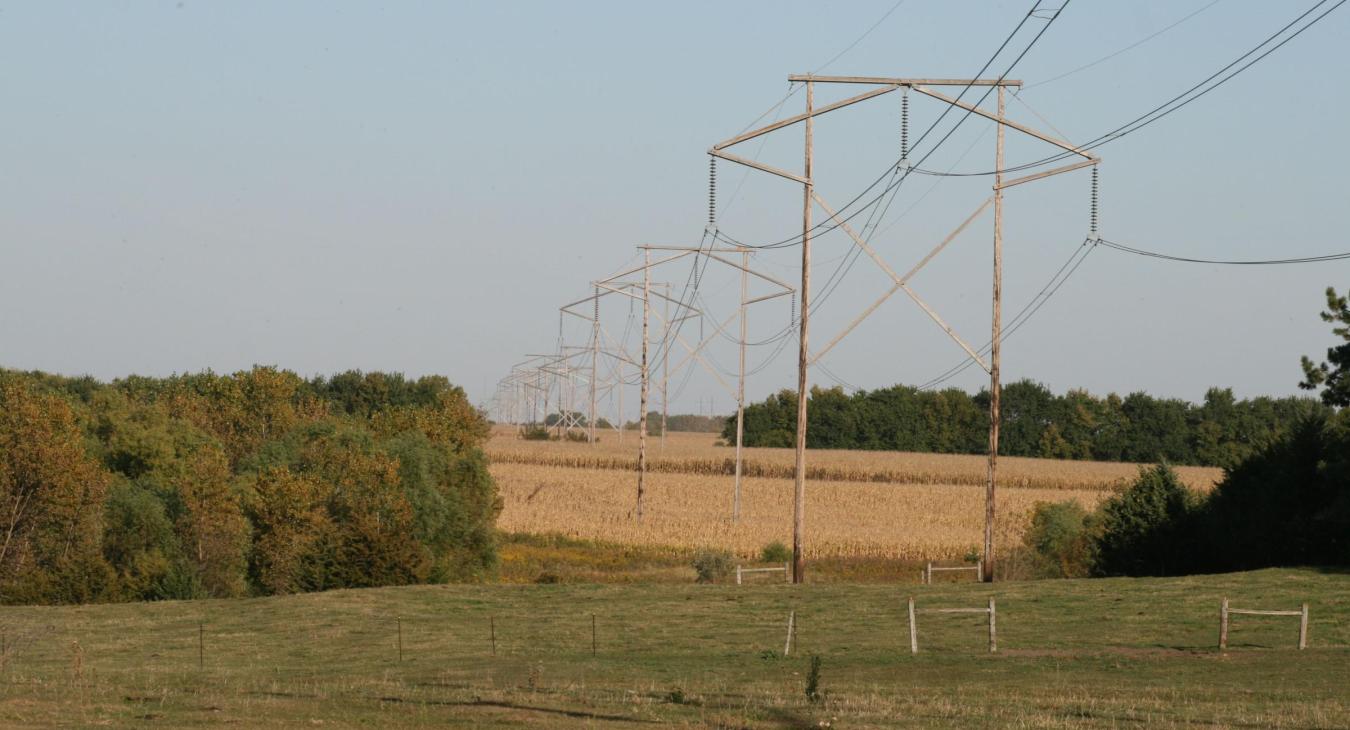 transmission power lines through a field